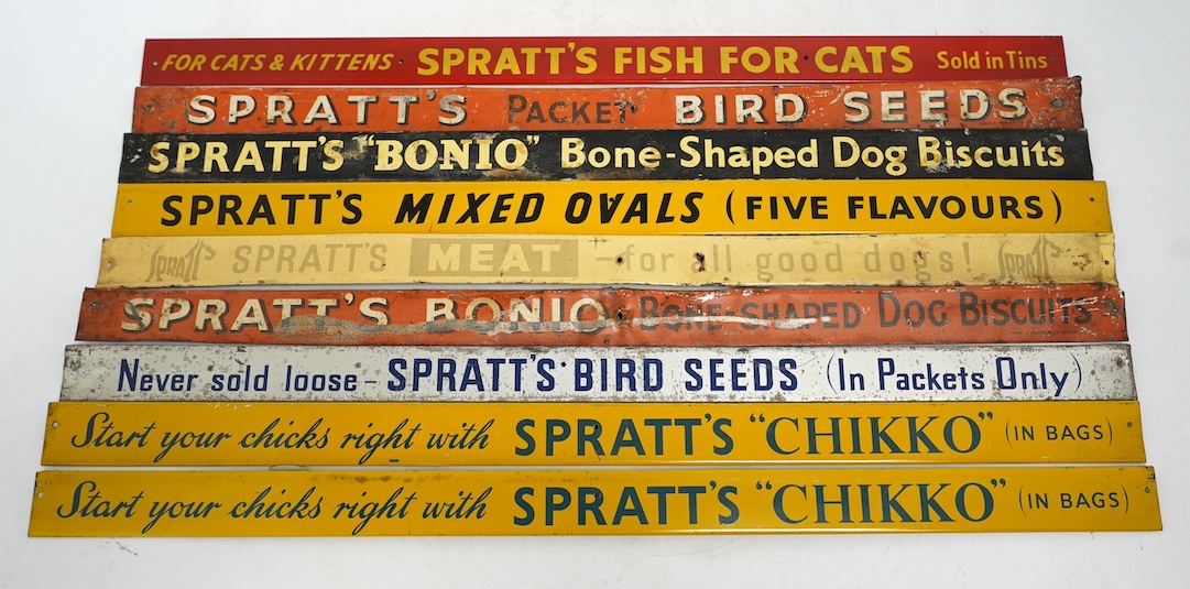 Nine mid century Spratt’s tinplate advertising shelf strips, length 52cm. Condition - poor-fair